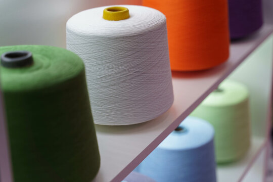 Premium yarn spools for textile production